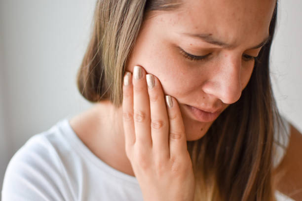 a woman with tooth sensitivity